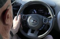 A Kia electric vehicle is driven