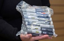A patient holds a bag of Wegovy pens in December 2024.