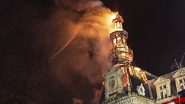 This photo taken by the Brigade des sapeurs-pompiers de Paris (BSPP) shows the burning roof and spire of the town hall in the 12ᵉ arr. of Paris, France, on 27.01.2025