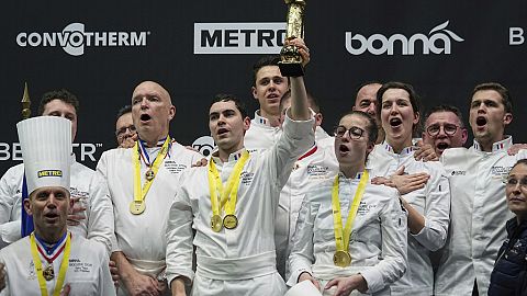 French chef Paul Marcon, center, celebrates with his teammates after winning the final of the "Bocuse d'Or" (Golden Bocuse) trophy, in Lyon, Monday, Jan. 27, 2025