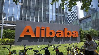 FILE - The logo of Chinese technology firm Alibaba is seen at its office in Beijing, Aug. 10, 2021
