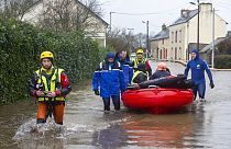  Police officers and rescuers evacuate residents as severe flooding hits western France during Storm Ivo on Wednesday, January 29, 2014, in Redon, western France.