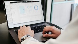 A computer programmer at work, one of the jobs that is likely to grow in demand