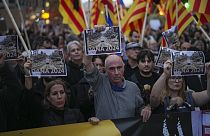 FILE: Demonstrators gather for a protest organized by social and civic groups, denouncing the handling of flooding in Valencia, Spain, Saturday, Nov. 9, 2024