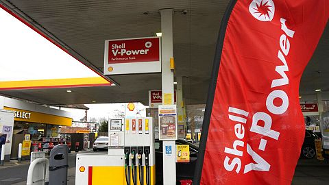 A flag flies at a shell petrol station in London, Thursday, Feb. 2, 2023. 