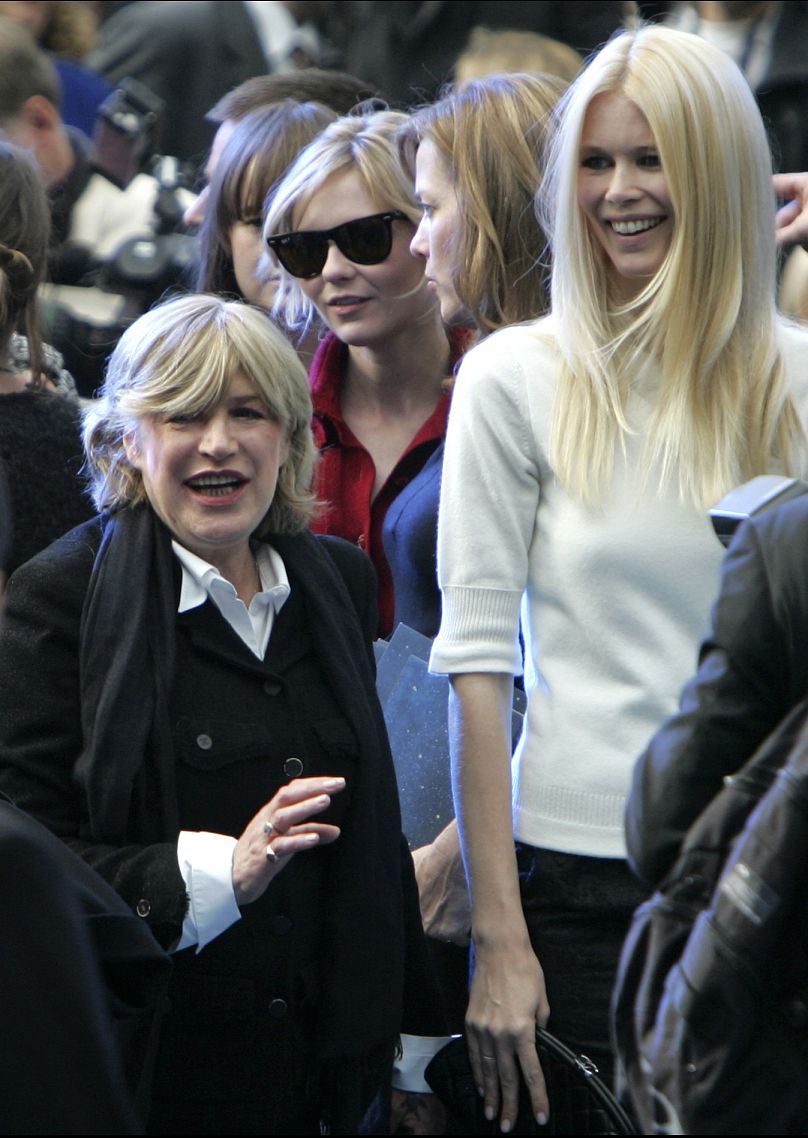 Marianne Faithfull, left, U.S. actress Kirsten Dunst, center with sunglasses, and German model Claudia Schiffer attend the Chanel's Spring-Summer 2008 collection - Paris 2007