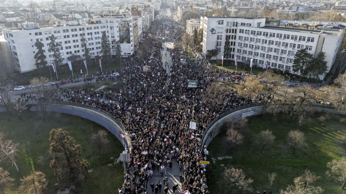 People block the Varadin bridge during a protest over the collapse of a concrete canopy killed 15 people more than two months ago, in Novi Sad, Serbia, Saturday, Feb. 1, 2025