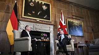 Britain's Prime Minister Keir Starmer, right, speaks with Germany's Chancellor Olaf Scholz during their bilateral meeting at the Chequers, in Aylesbury, England, Sun, Feb.25