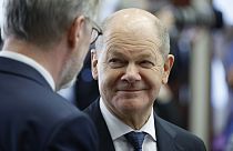 Germany's Chancellor Olaf Scholz, right, speaks with Czech Republic's Prime Minister Petr Fiala at a round table meeting during an EU summit in Brussels, Monday, Feb. 3, 2025.