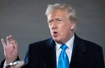President Donald Trump speaks to reporters next to Air Force One after arriving back at Joint Base Andrews, Md. 2 Feb 2025.