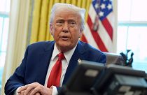 President Donald Trump speaks after signing executive orders in the Oval Office of the White House.