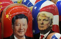 Traditional Russian wooden Matryoshka dolls depicting China's President Xi Jinping, left, and US President Donald Trump are on sale at a souvenir shop in Russia, Nov. 21, 2024
