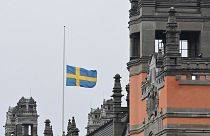 A Swedish flag flies at half-mast at Rosenbad, Sweden's Government Offices in Stockholm, Wednesday Feb. 5, 2025, after a shooting at an adult education center.