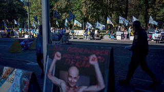 Family members of Ukrainian POWs support soldiers who defended Mariupol and are still in Russian captivity after two and half years, in Kyiv, 9 October 2024