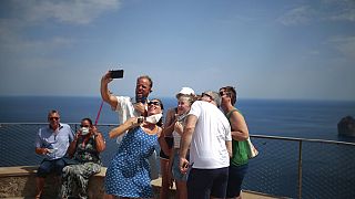 TikTok visitor stampedes have forced towns to cap bus numbers and block off iconic views. 