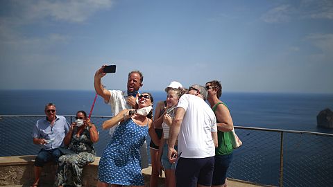 TikTok visitor stampedes have forced towns to cap bus numbers and block off iconic views. 