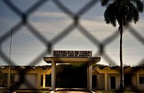 A gate marking the border with the US Guantanamo Bay naval base in Cuba.