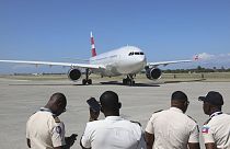 A plane transporting police officers from El Salvador, part of a UN-backed multinational force, lands at Toussaint Louverture Airport in Port-au-Prince, Haiti, Feb. 4, 2025.
