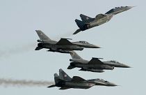 Two Russian-made Mig 2s (above) and two US-made F-16's fighter jets, all belonging to the Polish Air Force.
