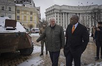 Britain's Foreign Secretary David Lammy looks at damage on a Russian APC, in central Kyiv, Ukraine, Wednesday, Feb. 5, 2025.