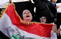 FILE - Protesters gather to demonstrate against a proposed law to permit underage female marriage in Tahrir Square in Baghdad, Iraq, 8 August, 2024. 