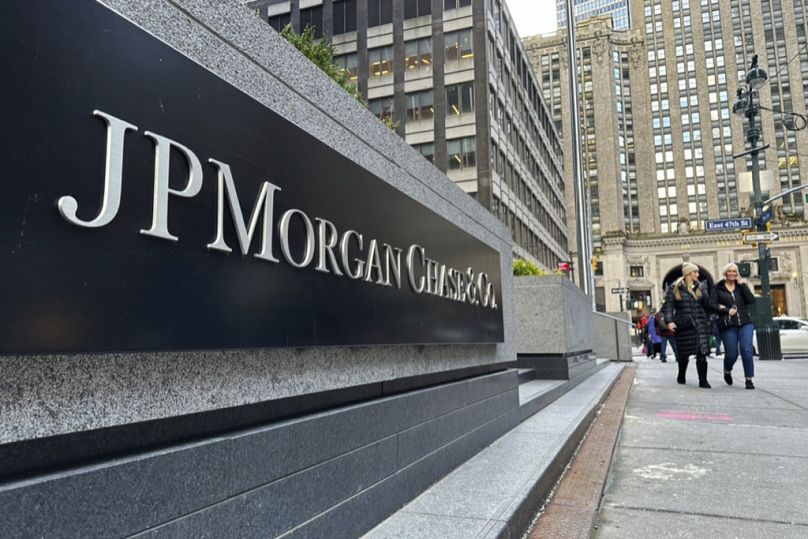 Pedestrians approach JP Morgan Chase headquarters in New York.