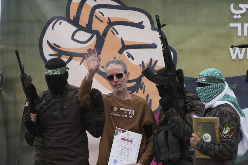 Israeli captive Ohad Ben Ami being released by Hamas fighters, Deir al-Balah, Gaza, February 8 2-25