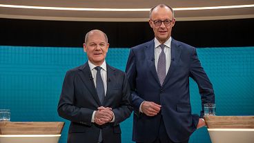 German Chancellor Olaf Scholz, left, and Friedrich Merz, CDU candidate for chancellor before a TV election debate in Berlin. 9 February 2025.