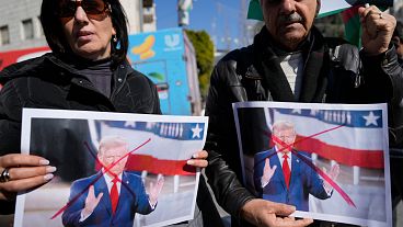 Palestinians carry defaced pictures of U.S. President Donald Trump while protesting against his statements regarding the transfer of Palestinians from Gaza, 29 January 2025. Palestinians carry defaced pictures of U.S. President Donald Trump while protesting against his statements regarding the transfer of Palestinians from Gaza, 29 January 2025.