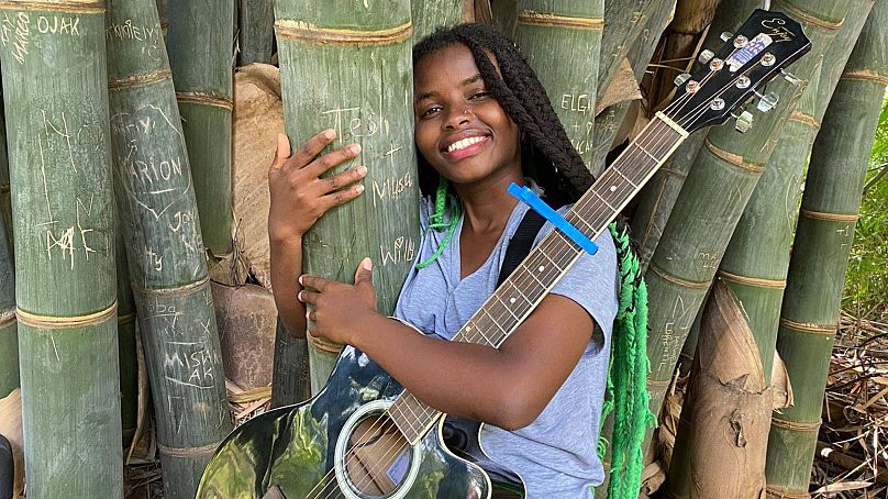 When not tree-hugging for mental health, Truphena Muthoni plays music