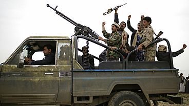 FILE: Houthi rebels fighters chant slogans in Sanaa, Yemen, 1 Aug, 2019.
