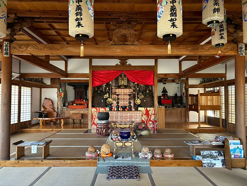 The road continues to the post town of Magome with the snow-capped Kiso mountains as a backdrop. 