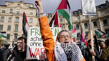 Protestors shout slogan during a protest against the Munich Security Conference in Munich, Saturday, Feb. 15, 2025