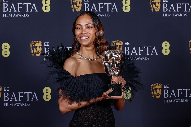 Zoe Saldana, winner of the supporting actress award for 'Emilia Perez', poses at the 78th British Academy Film Awards, BAFTA's