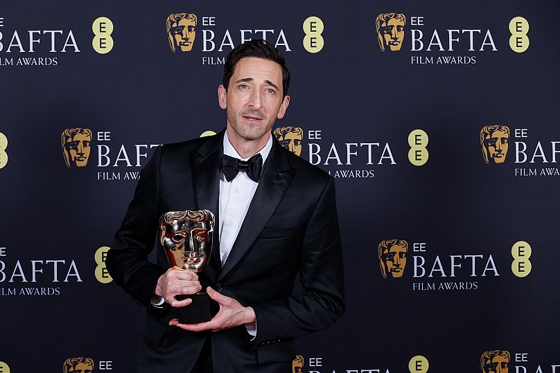 Adrien Brody poses with the leading actor award for 'The Brutalist' at the 78th British Academy Film Awards, BAFTA's. 