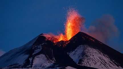 Thousands of hikers climb Sicily's Mount Etna to witness eruption