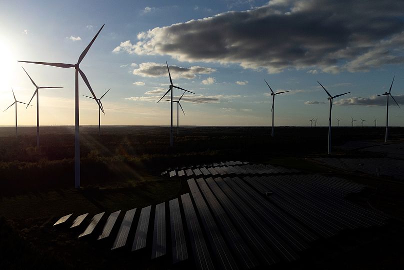 FILE: Wind turbines spin at the Klettwitz Nord solar energy park near Klettwitz, October 2024