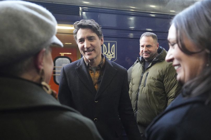 Canada's Prime Minister Justin Trudeau arrives at a train station on the third anniversary of the Russian invasion of Ukraine, Kyiv, Ukraine, Monday, Feb. 24, 2025.