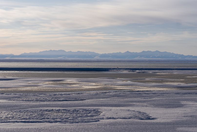 The Kaktovik Lagoon and the Brooks Range mountains of the Arctic National Wildlife Refuge are seen in the distance, Alaska, US. 