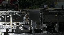 Israeli police inspect the scene of one of a series of bus explosions in what authorities said appeared to be a militant attack in Bat Yam, central Israel, Feb 20, 2025