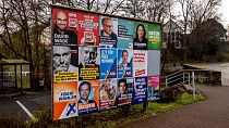 Election posters of various parties are pictured near Frankfurt, Germany, Friday, Feb. 21, 2025.