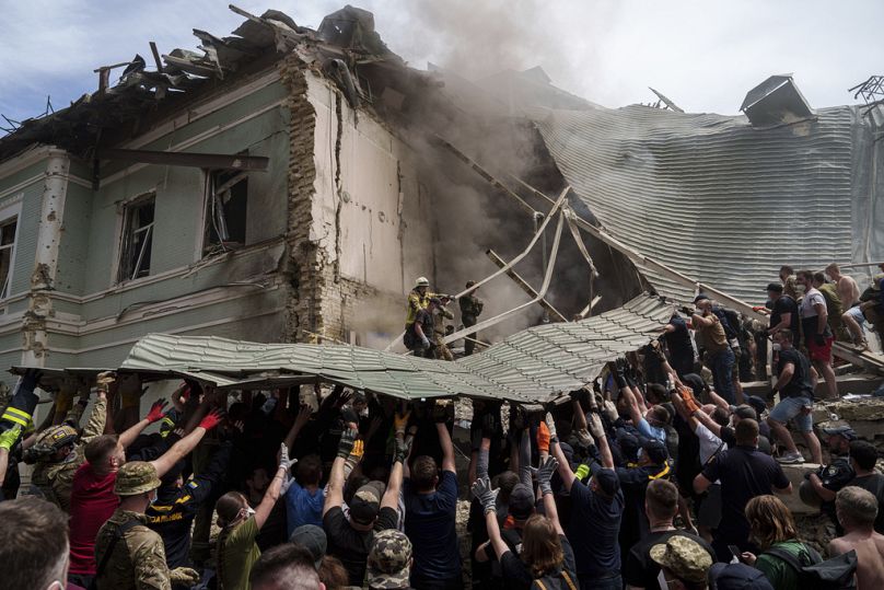 Emergency services work at the site of Okhmatdyt children's hospital hit by a Russian missile in Kyiv, Ukraine, on July 8, 2024.