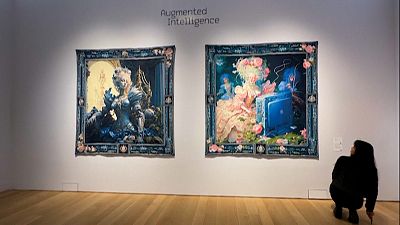 AI-generated tapestries on display at Christie's AI art auction, on February 20 in New York.