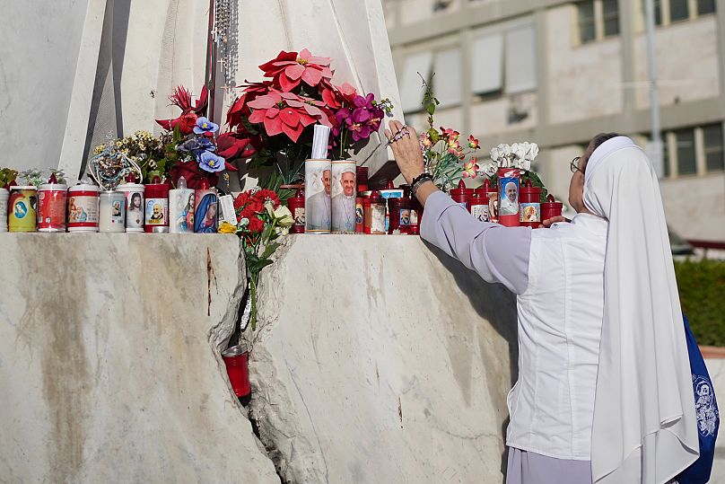 A nun prays at the Gemelli Polyclinic in Rome, 21 February, 2025