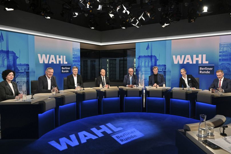 Amira Mohamed Ali, Jan van Aken, Robert Habeck, Olaf Scholz, Friedrich Merz, Markus Söder, Alice Weidel, and Christian Lindner in Berlin, Feb. 23, 2025. 