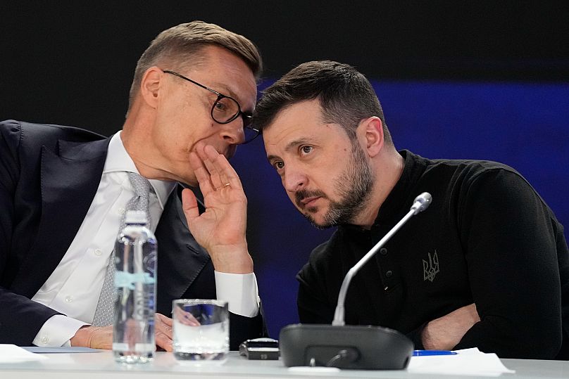 Ukrainian President Volodymyr Zelenskyy listens to Finland’s President Alexander Stubb during a news conference at a summit in Kyiv, 24 February, 2025