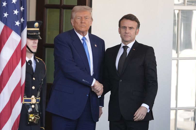 President Donald Trump, left, greets France's President Emmanuel Macron before a news conference at the White House, Monday, Feb. 24, 2025, in Washington