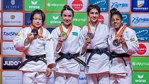 The podium in the -48 kg category. ABUZHAKYNOVA Abiba (KAZ) took gold.