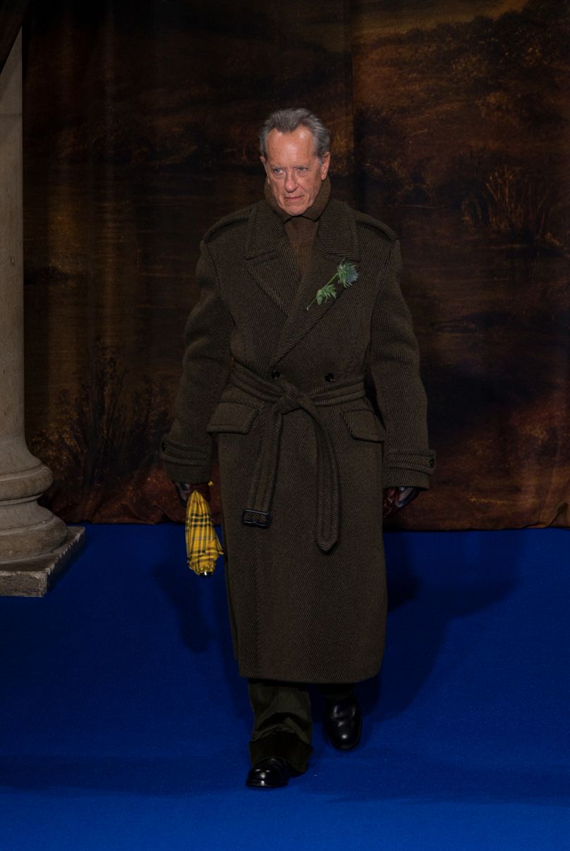 Richard E. Grant displays a creation from Burberry during their Fall/Winter 2025/26 show as part of London Fashion Week.