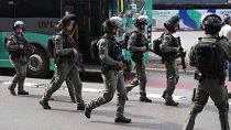 Israeli security forces secure the scene of a stabbing attack in Haifa, 3 March 2025